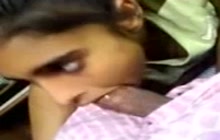 Busty Indian girl blowing a cock