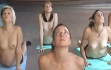 A lot of naked women doing yoga