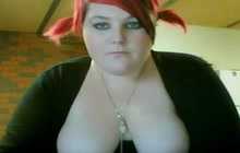 Redhead BBW exposes her big tits